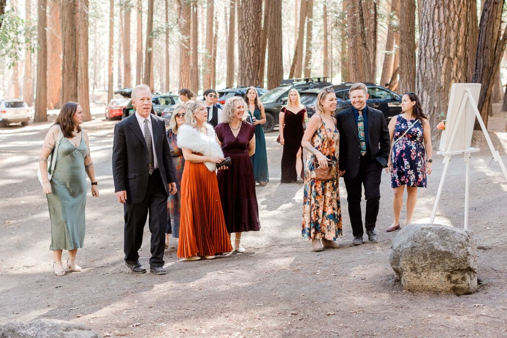 Guests gather for a Yosemite brunch at Cathedral Beach for a wedding.