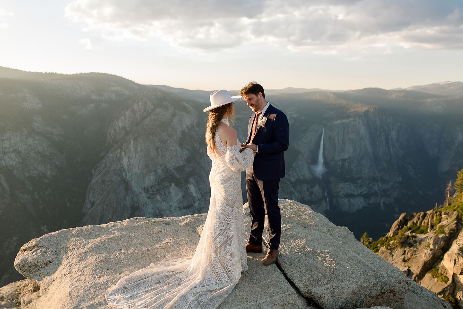 A couple exchanges vows overlooking Yosemite Valley.