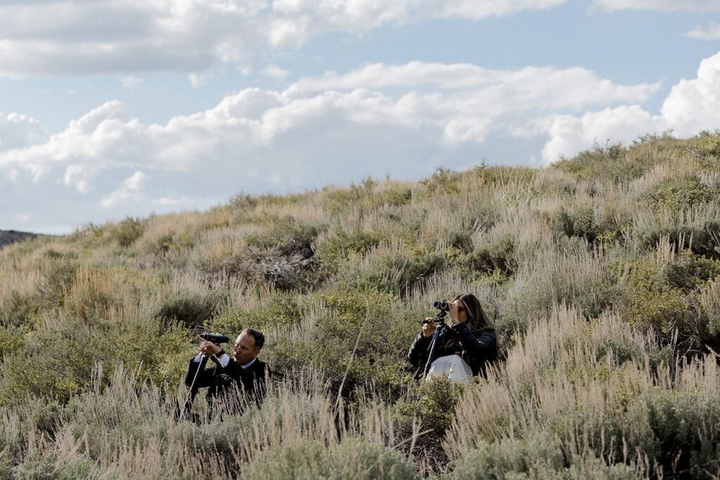 A bride and groom do their favorite activity- glassing- on their Mammoth Lakes Wedding day.