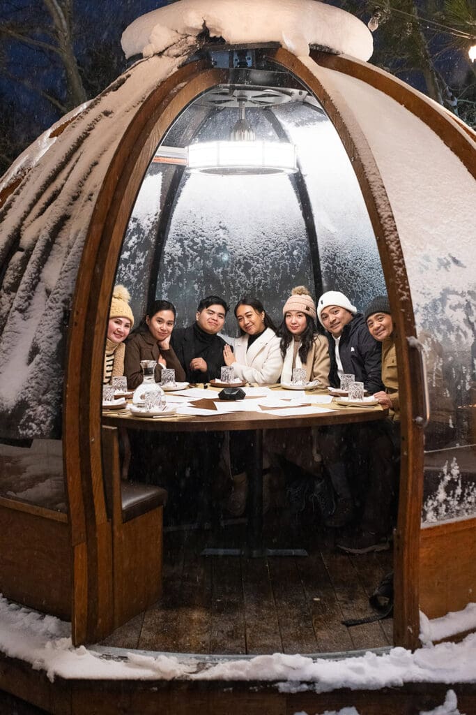 The entire guest list at a micro wedding share a pod at Vulcania in Mammoth Lakes.