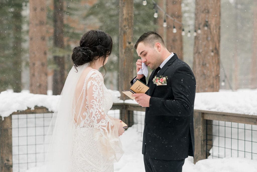 A groom tears up during his vows on his Mammoth Lakes Wedding day.